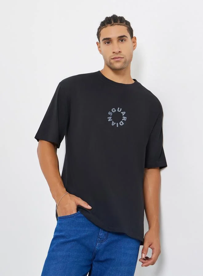 Styli Men Black Slogan Print Oversized T-Shirt