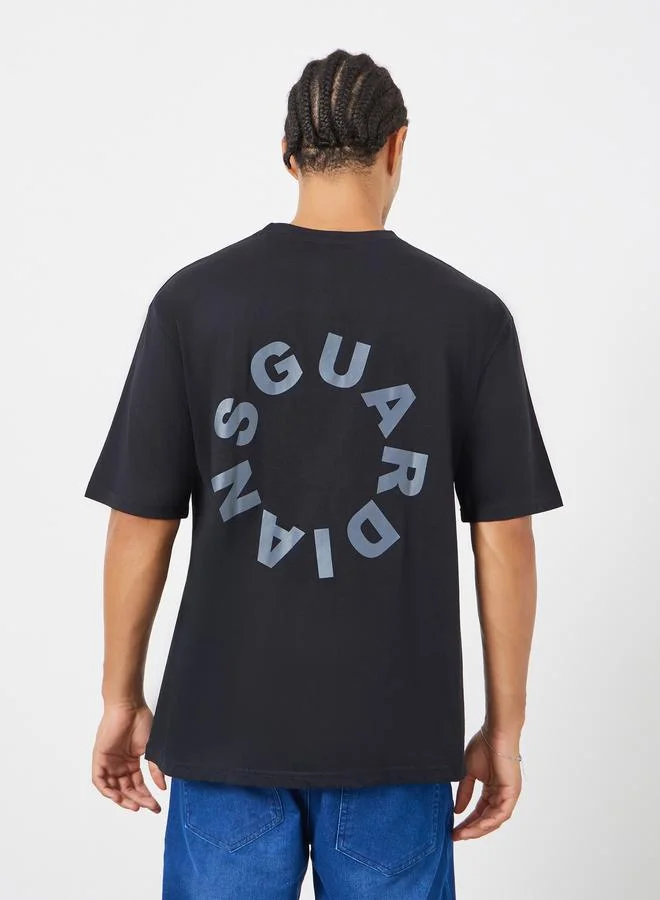 Styli  Men Black Slogan Print Oversized T-Shirt for Men | Best Price UAE
