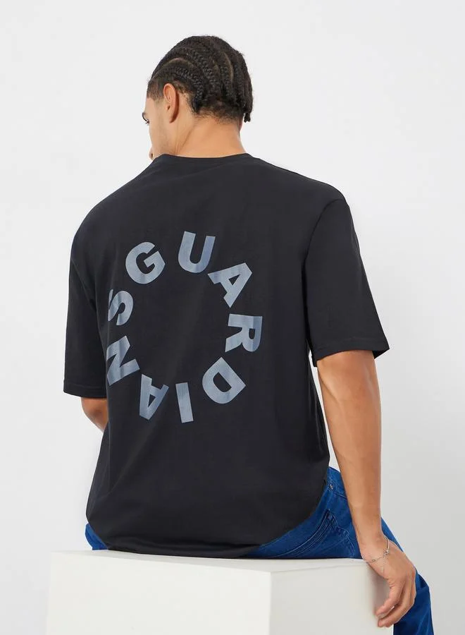 Styli  Men Black Slogan Print Oversized T-Shirt for Men | Best Price UAE
