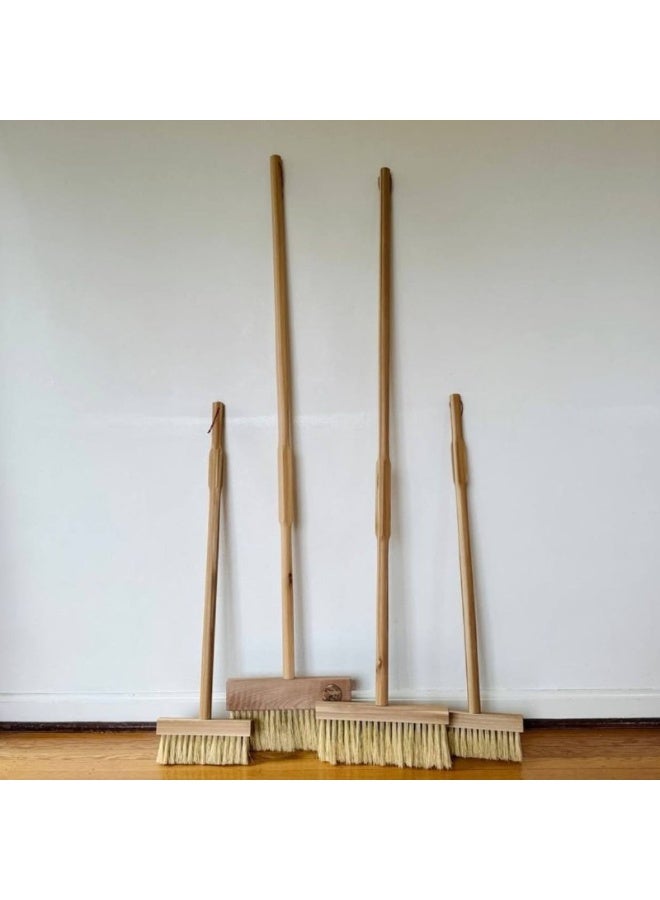 Floor broom with a bamboo wood handle