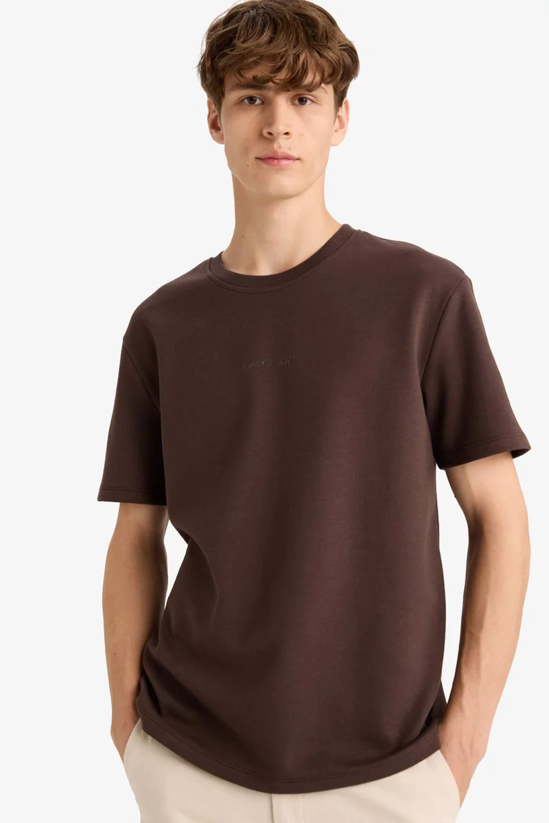 ديفاكتو Boxy Fit Crew Neck Printed Short Sleeve T-Shirt