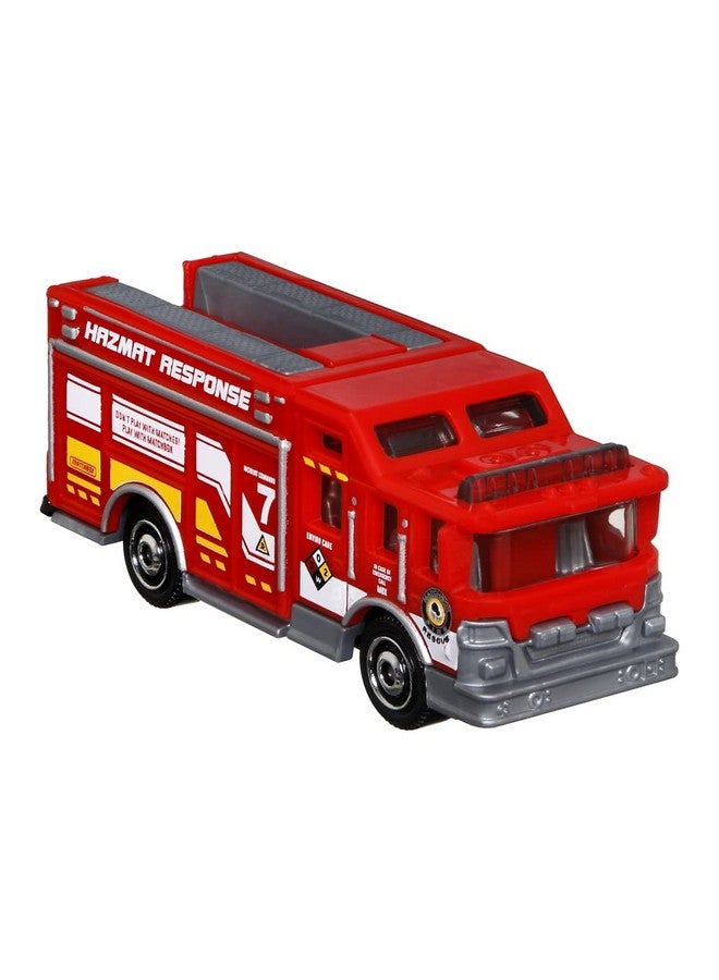 Matchbox Hitch & Haul Die-cast Vehicle Playset - Fire Rescue ~ 6 Piece Set ~ Hazmat Response Truck and Ambulance ~ Includes Firefighters, Billboard Sign and 2 Safety Barriers - Image 2