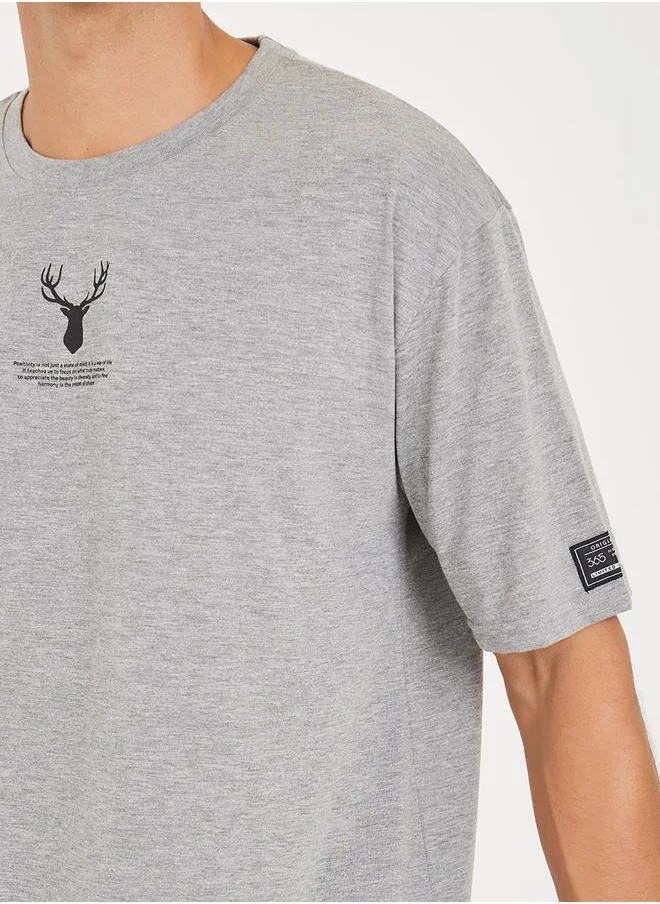 Styli Reindeer Graphic Oversized T-Shirt with Sleeve Badge