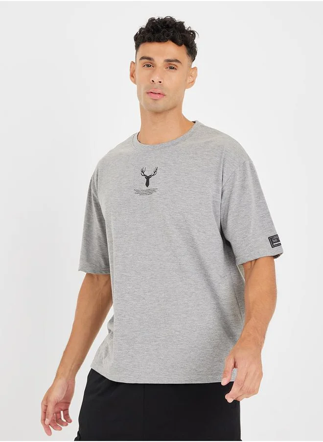 Styli Reindeer Graphic Oversized T-Shirt with Sleeve Badge