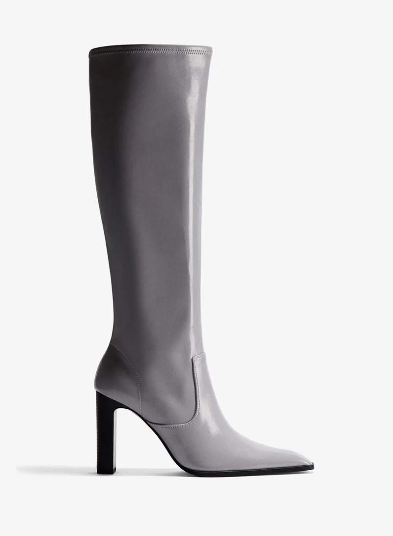 اتش اند ام بووت بطول يصل للركبة