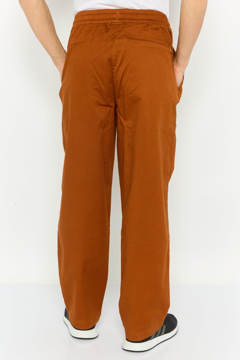 PUMA Men Sportswear Fit Embroidered  Logo Outdoor Sweatpants, Rust Brown  - Image 3