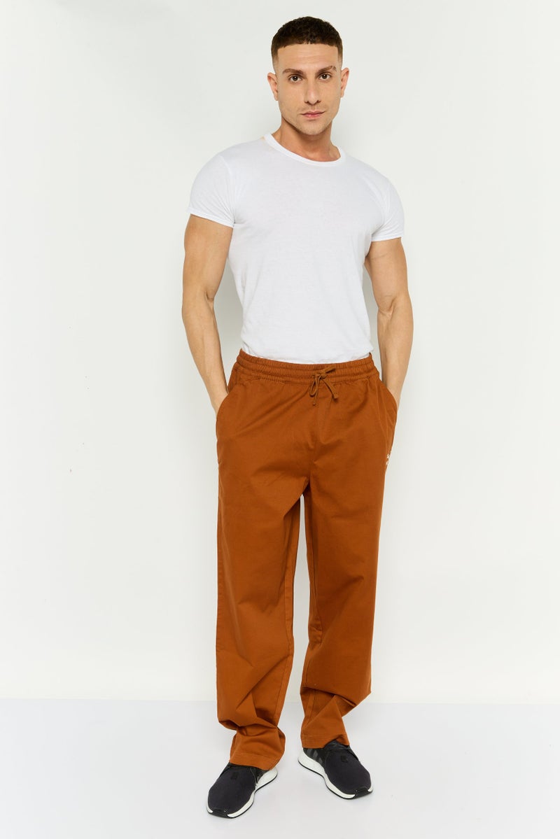 PUMA Men Sportswear Fit Embroidered  Logo Outdoor Sweatpants, Rust Brown  - Image 4