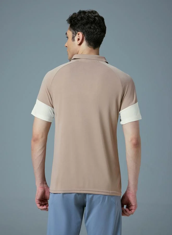 تكنوسبورت تيشيرت بولو سليم فيت بأكمام قصيرة وتصميم Color Block من تكنوسبورت