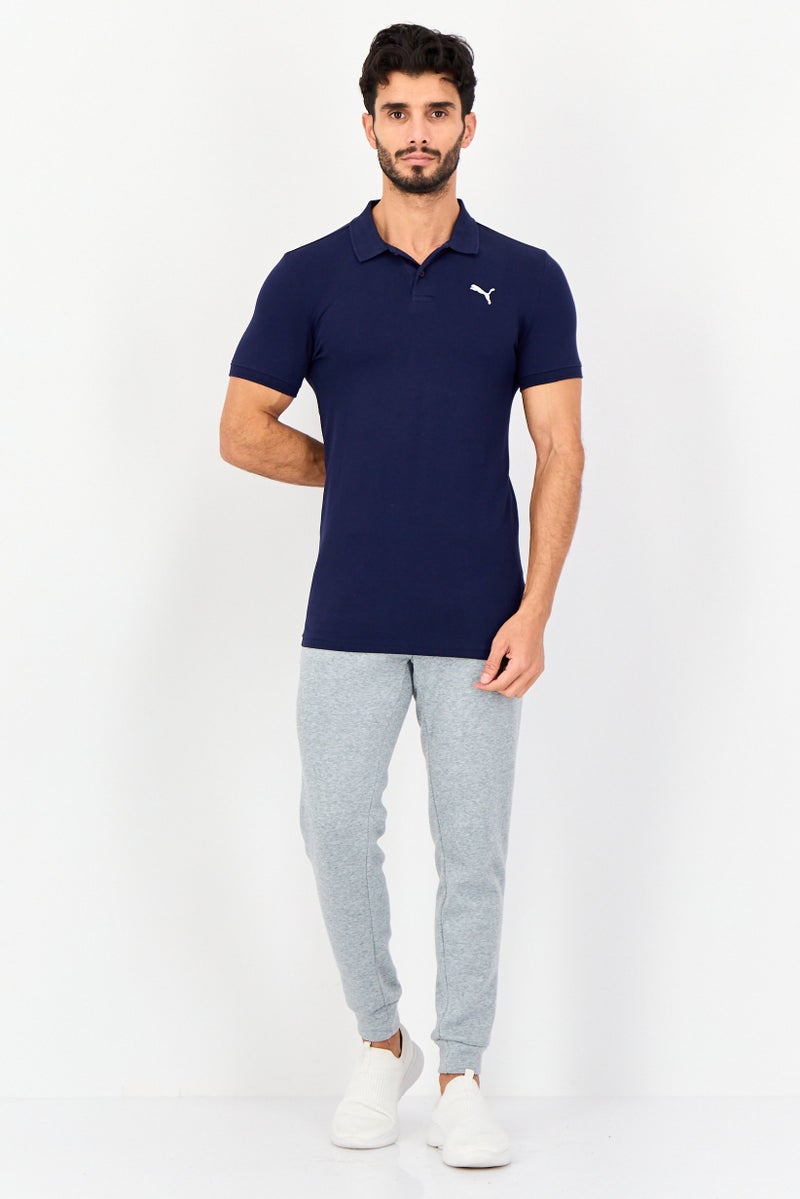 PUMA قميص بولو خارجي بأكمام قصيرة للرجال بتصميم عادي مع شعار مطرز، لون كحلي - Image 3