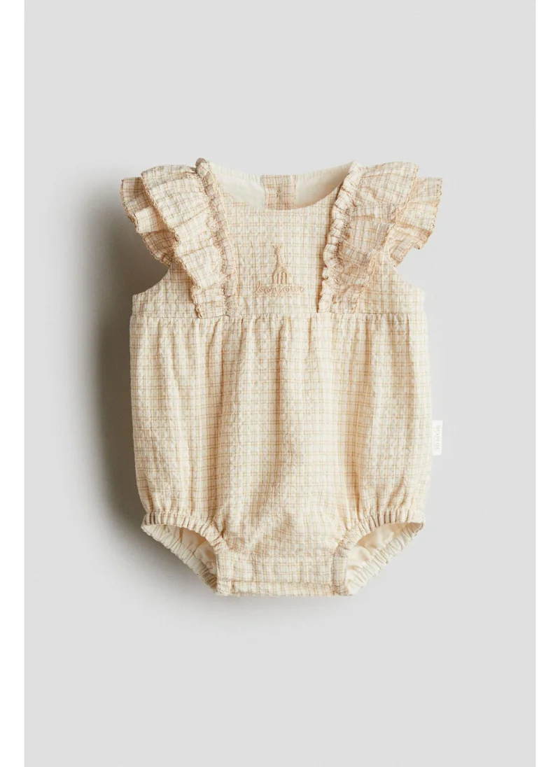 H&M Embroidery-detail seersucker romper suit