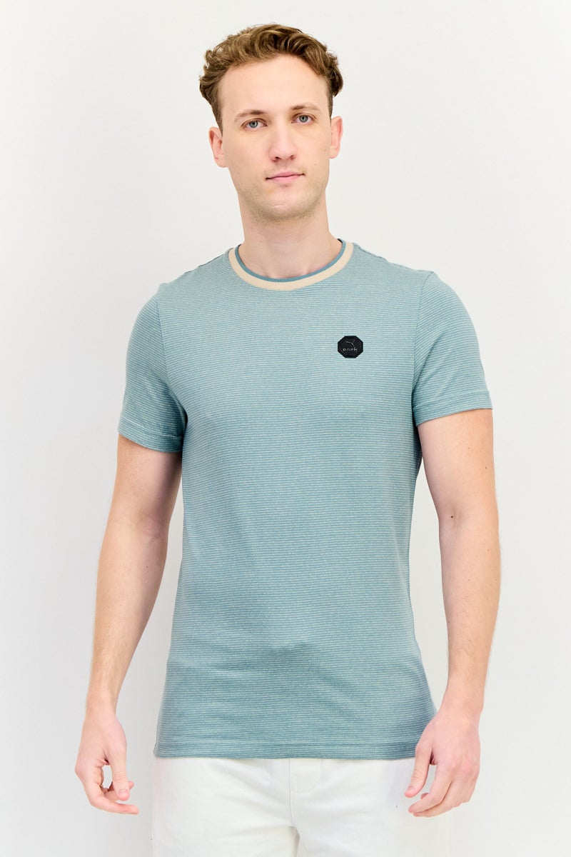 PUMA تي شيرت رجالي قصير الأكمام بتصميم جرافيكي ضيق، أخضر رمادي - Image 1