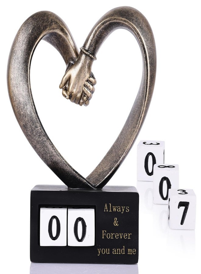DOVDOV Heart-Shaped Hand-in-Hand Sculpture. Perfect for 1st to 50th or 60th Anniversaries, Wedding for Newlyweds/Couples, Resin Bronze-Colored Heart-Shaped Home Decor, Romantic Love Statue. - Image 1