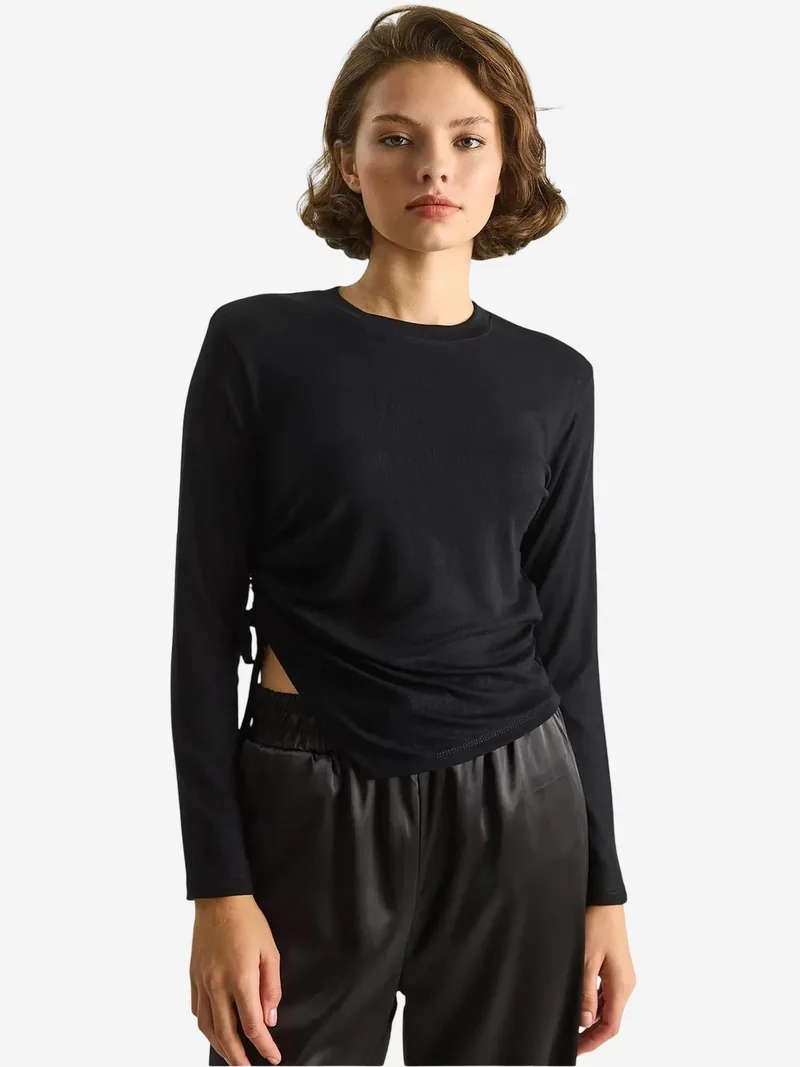 بيانكو لوتشي لوتشي توب أساسي بحافة غير متماثلة