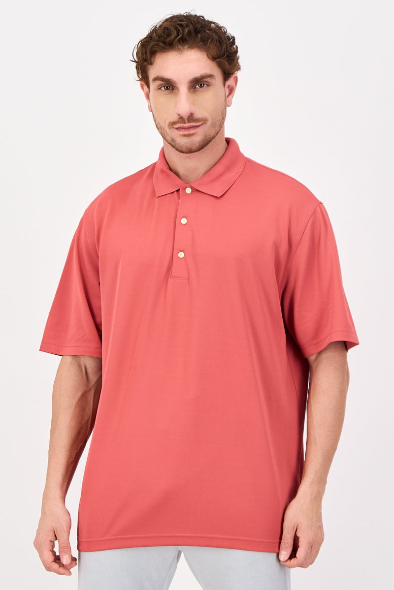 Greg Norman Men Sportswear Fit Short Sleeve Outdoor Polo Shirt, Pastel Red - Image 1