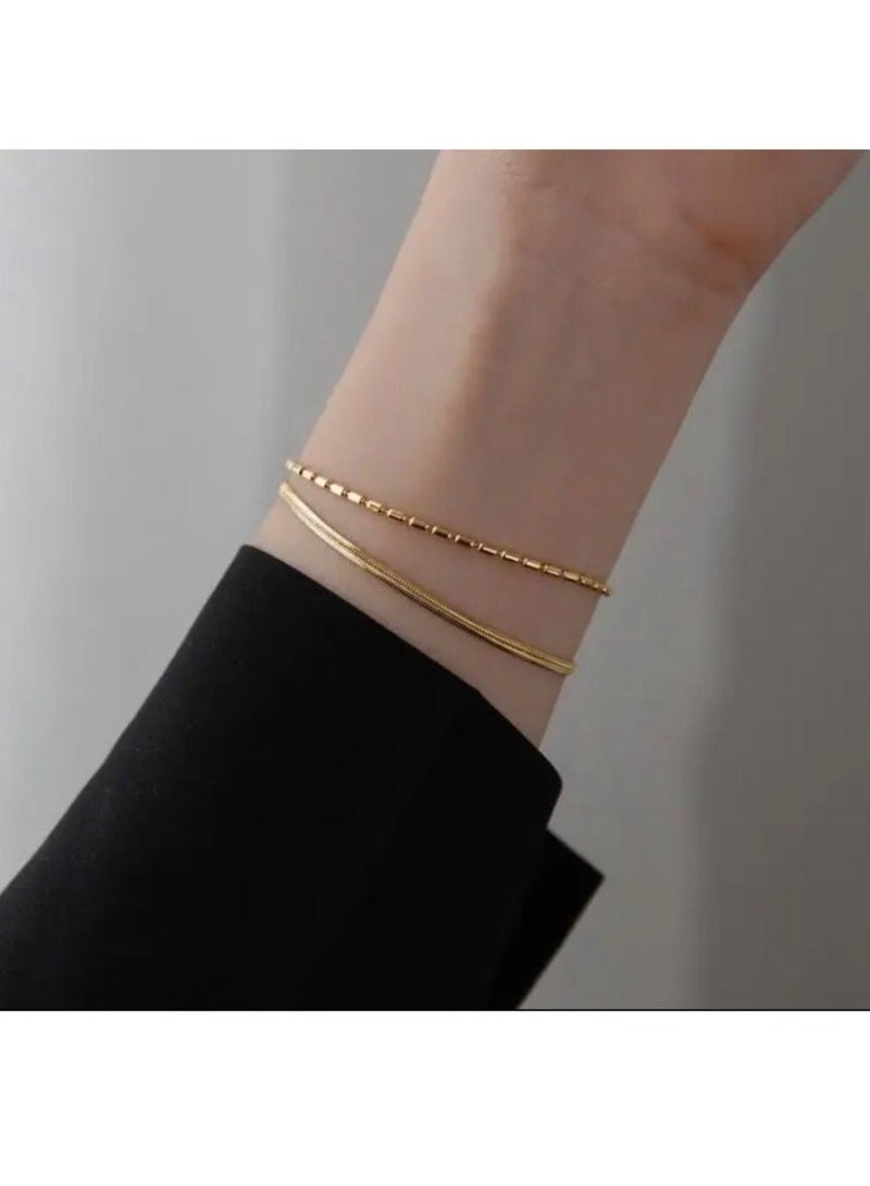 نونز أب اسوارة نسائية من الاستانلس ستيل مطلية باللون الذهبي عيار 18 - Image 1