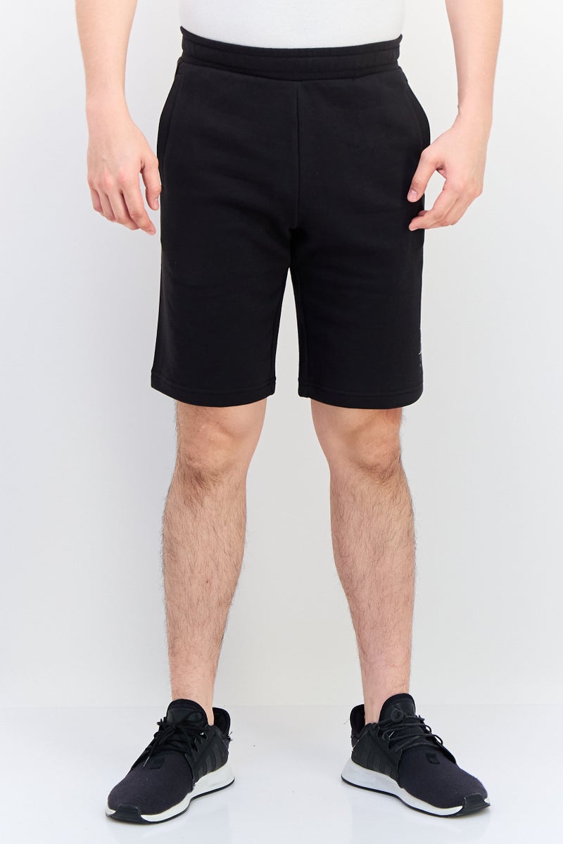 PUMA Men Sportswear Fit Brand Logo Outdoor Shorts, Black - Image 1