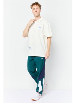 Reebok Men Loose Fit Short Sleeve Outdoor Polo Shirt, Ivory  - Image 2