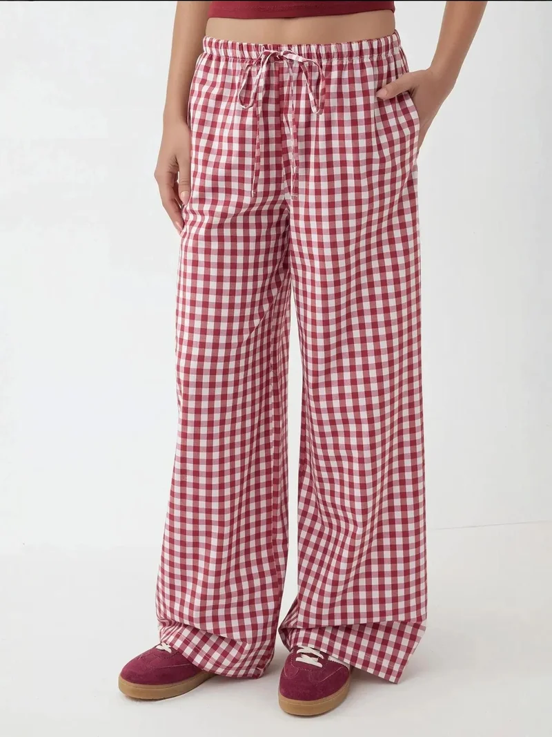 زوبعة بنطلون كاروهات واسع الأرجل