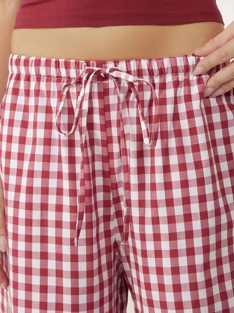 زوبعة بنطلون كاروهات واسع الأرجل