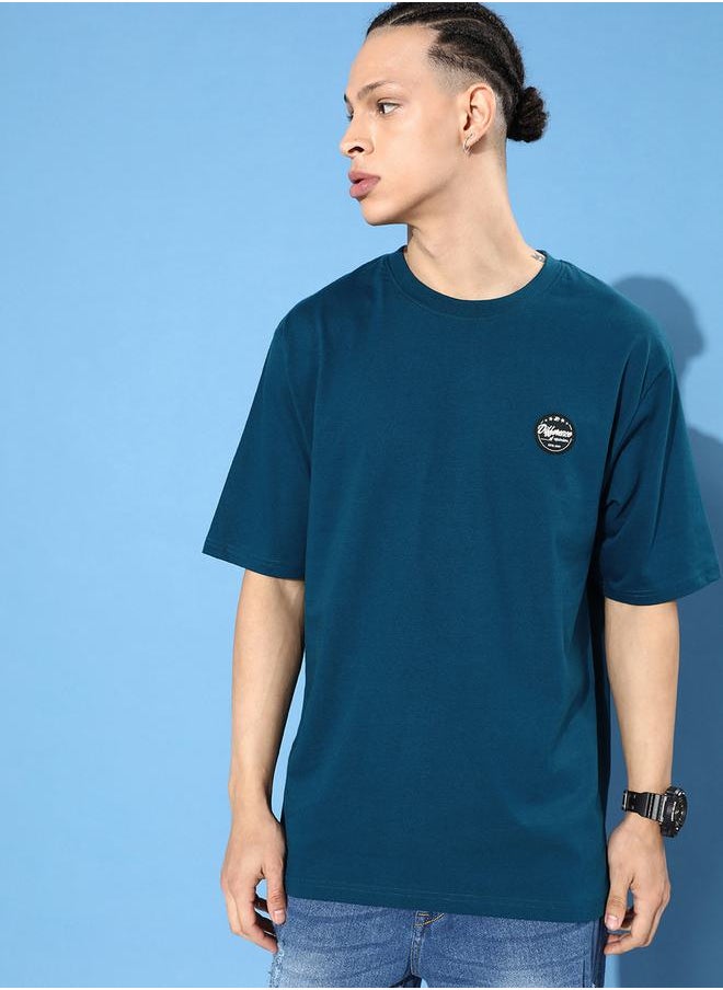 Difference of Opinion - Oversized Believe Back Print T-Shirt with Badge Detail by Styli - Image 1