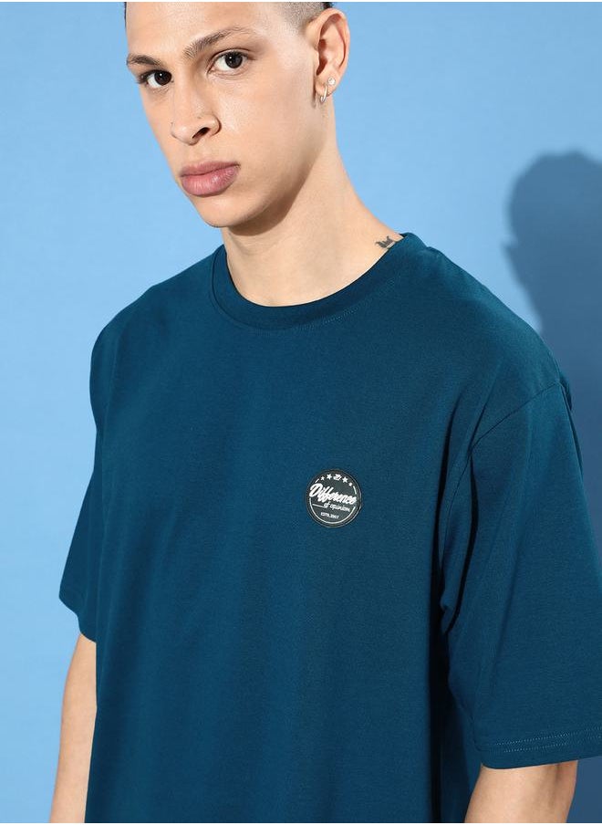 Difference of Opinion - Oversized Believe Back Print T-Shirt with Badge Detail by Styli - Image 1