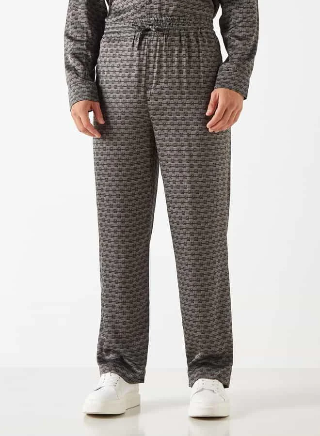 Emperor Emperor All-Over Print Pants with Drawstring Closure and Pockets