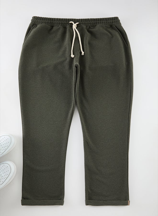 trendyol Khaki Plus Size Regular Cut Textured Sweatpants TMNAW25AJ00010  - Image 2