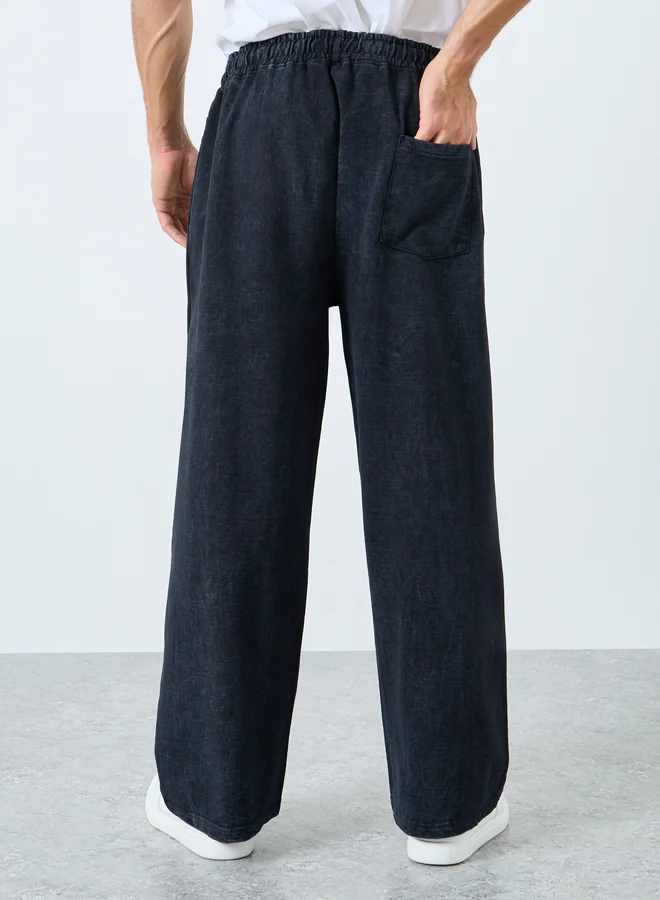 Styli Styli Acid Wash Wide Leg Terry Joggers with Pleat Detail