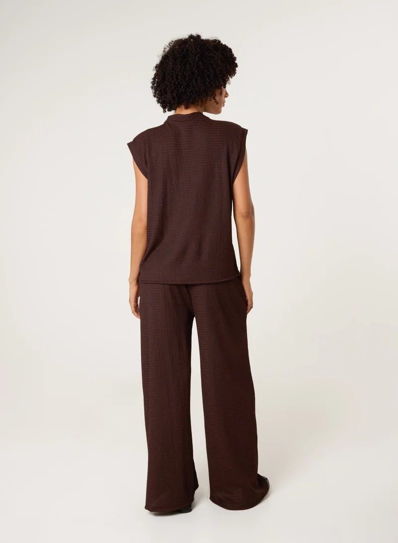 بلو فانيلا طقم نسائي بأزرار ذهبية