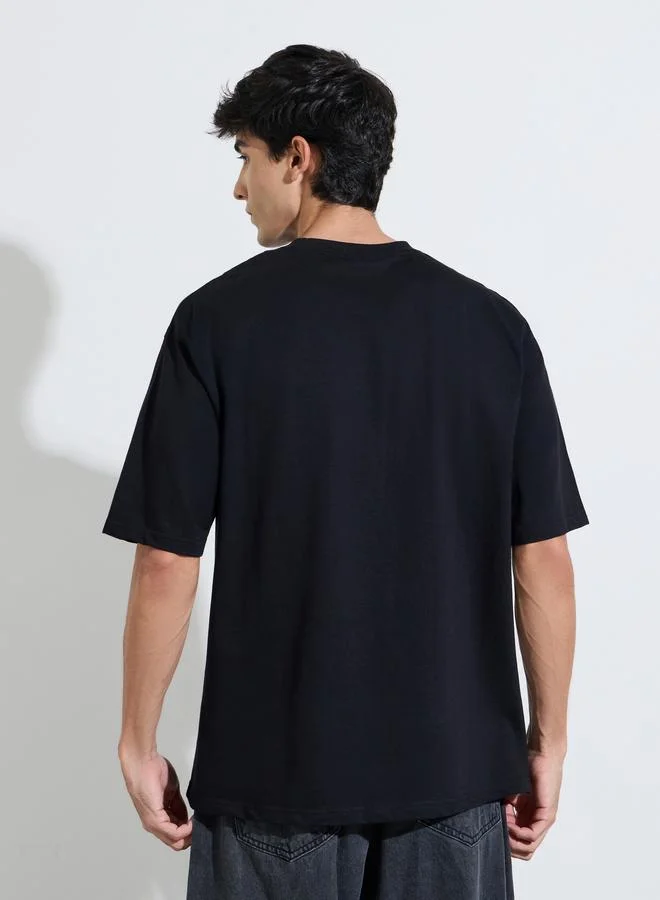 Styli  Black Silicon Print Crew Neck Short Sleeves Oversized T-Shirt for Men | Best Price UAE