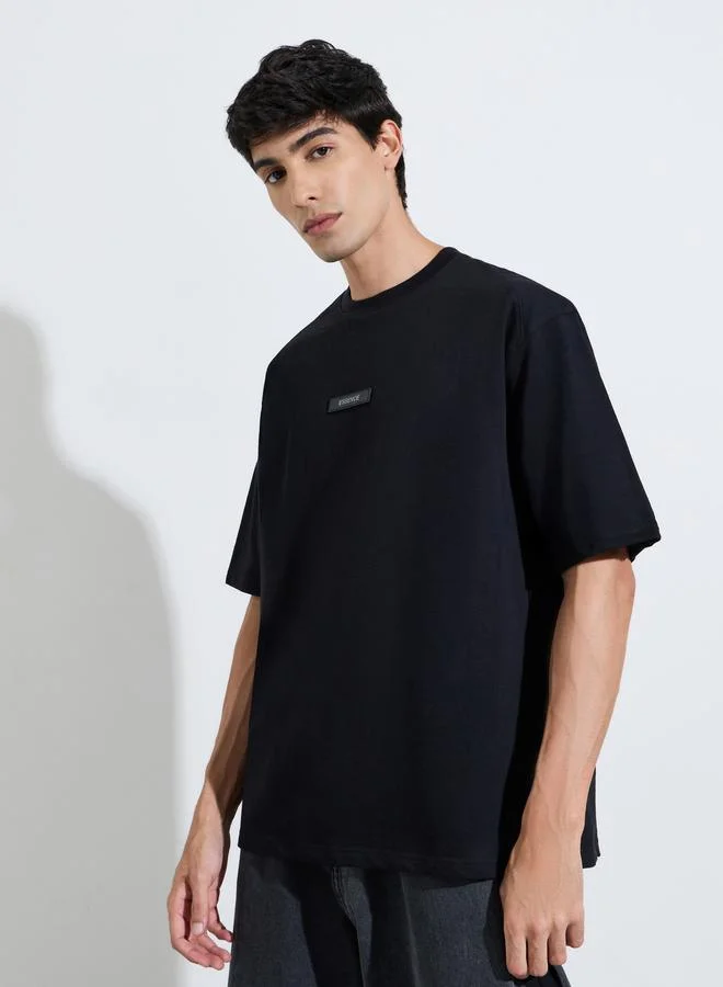 Styli  Black Silicon Print Crew Neck Short Sleeves Oversized T-Shirt for Men | Best Price UAE
