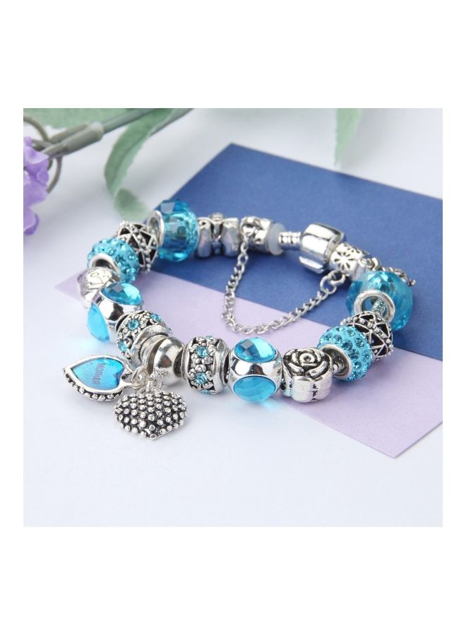 بيوينتي سوار مزين بحلية على شكل زهرة وخرز زجاجي - Image 2