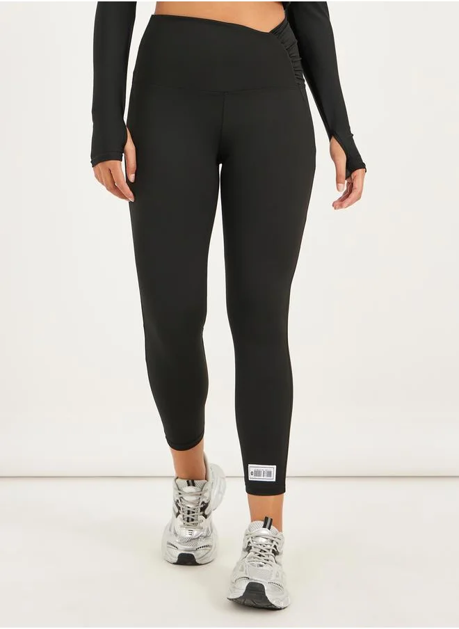 ستايلي Gymspire Edition - Label Ruched Waist 7/8 Leggings