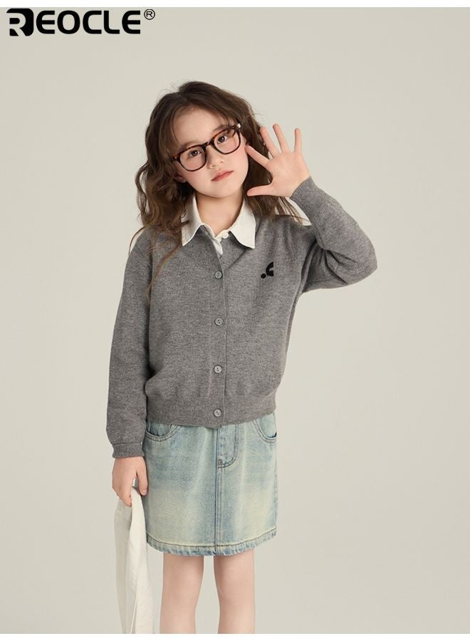 ريوكل سترة أطفال مطرزة بخياطة دقيقة وتصميم فضفاض ومريح. قمة محبوكة بلون موحد للأطفال من قماش ناعم وقابل للتنفس للارتداء اليومي المريح. - Image 1