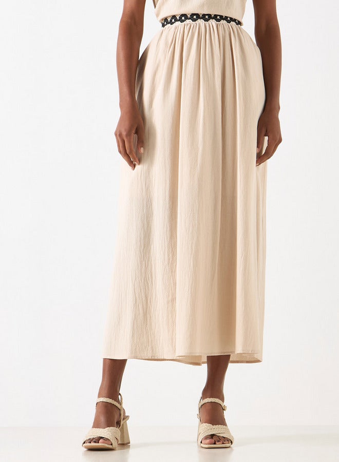 تواكستريمز تنورة إيه لاين طويلة بارزة الملمس مع خصر مطاطي بتفاصيل كروشيه من تو إكستريمز - Image 1