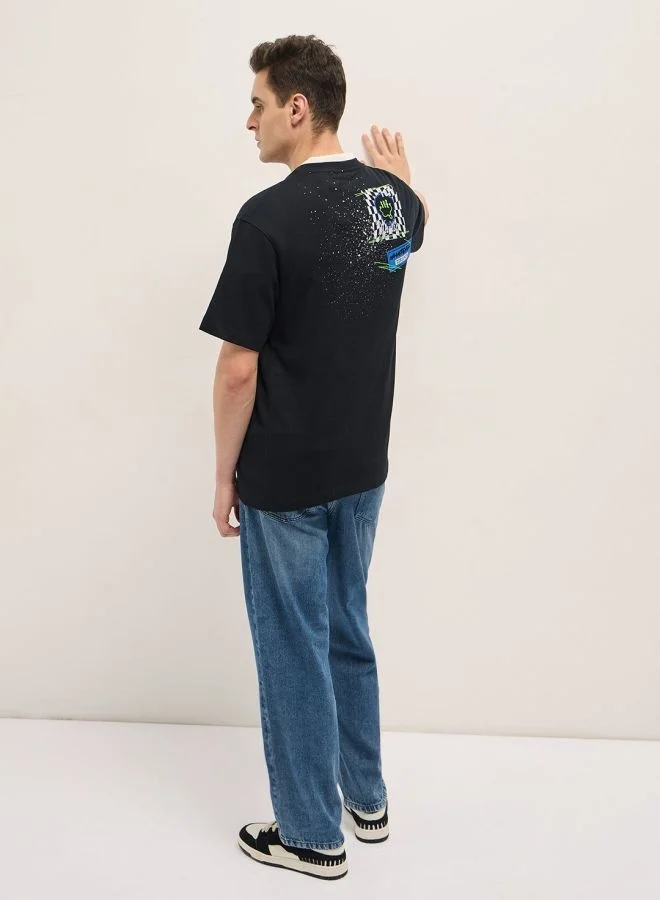 THE BEAR HOUSE  Men's Black Oversize Graphic Splatter Crew Neck T-shirt Perfect For Casual Wear, Gym, Travel, Or Layering Stylish And Versatile Essential For Every Wardrobe for Men | Best Price UAE