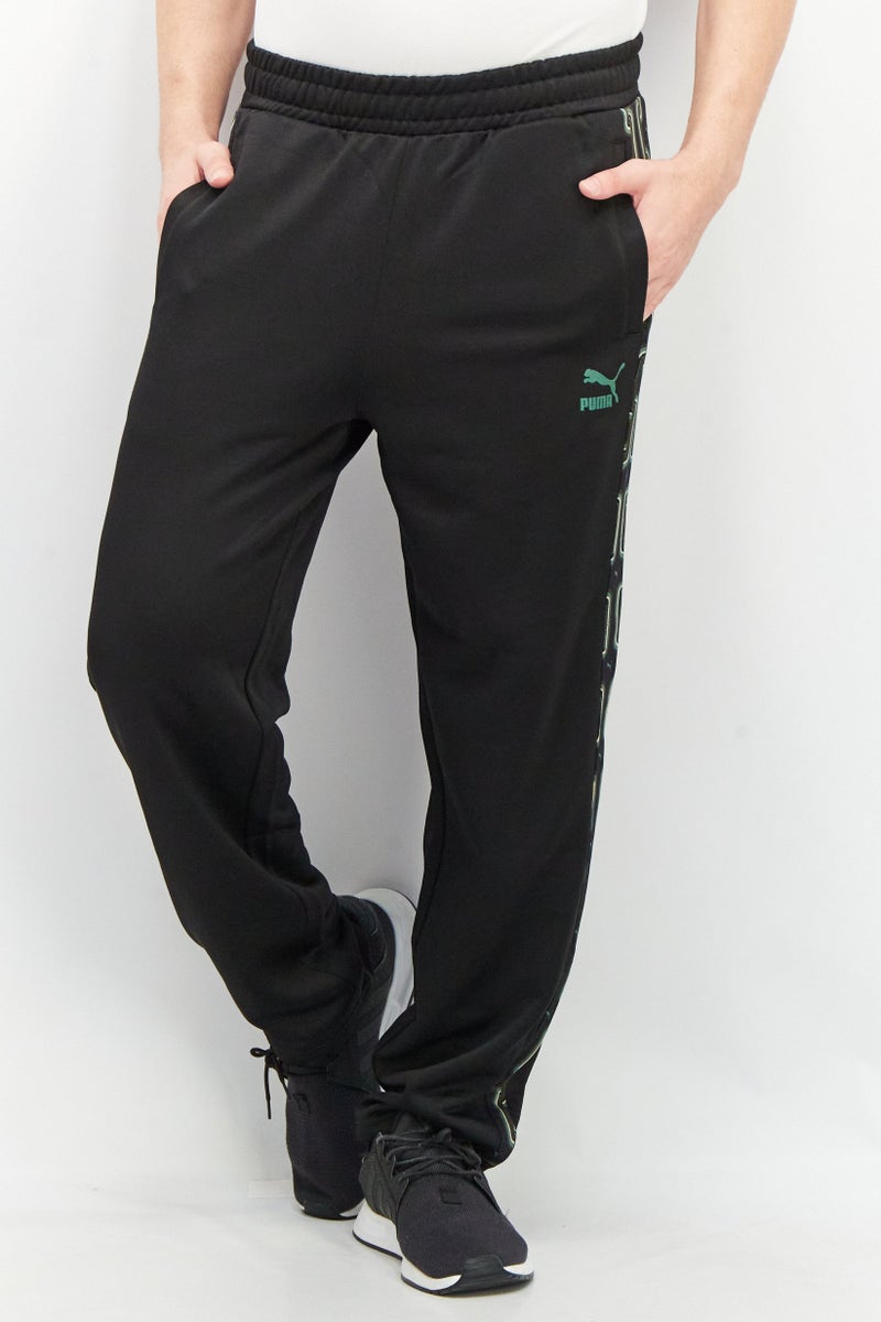 PUMA Men Sportswear Fit Brand Logo Drawstring Track Pants, Black - Image 1