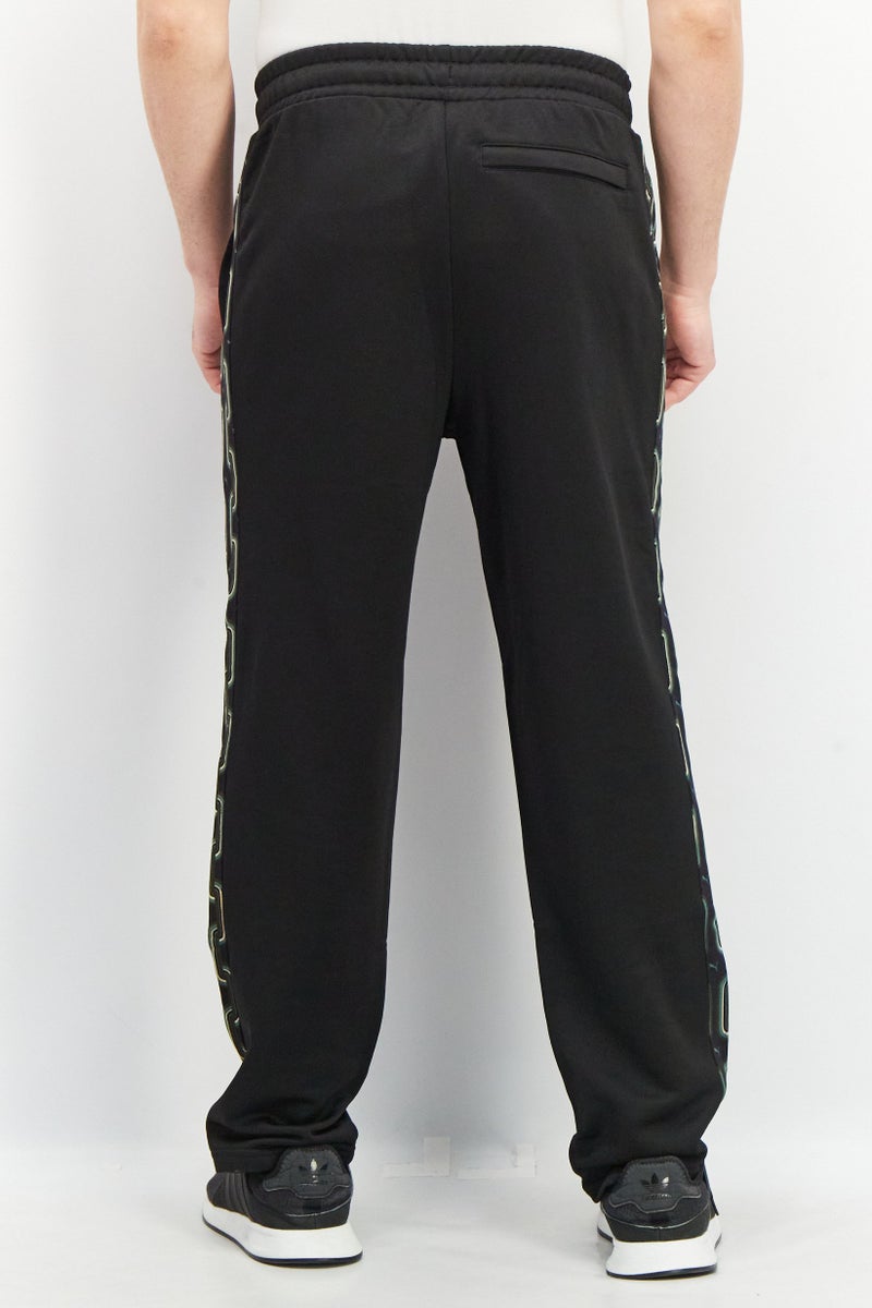 PUMA Men Sportswear Fit Brand Logo Drawstring Track Pants, Black - Image 3