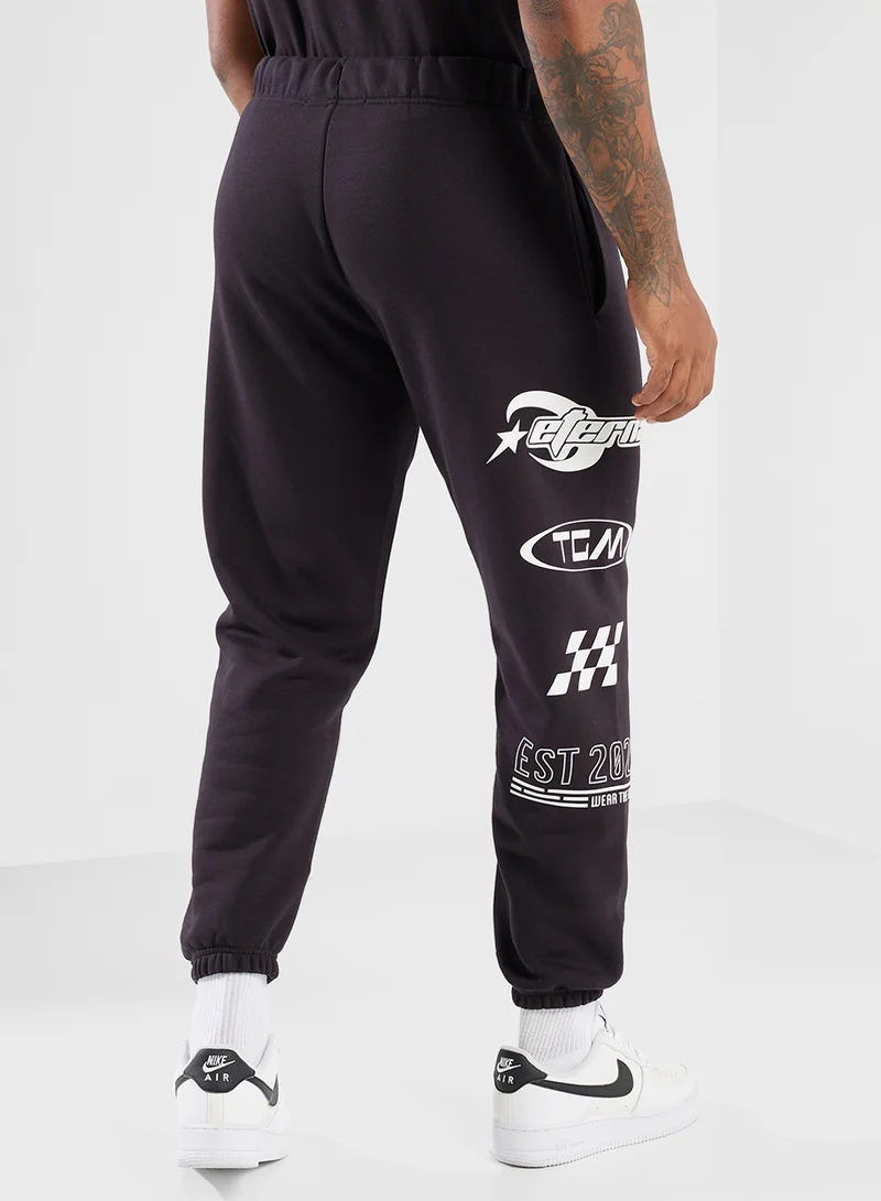 The Giving Movement Relaxed Fitted Racing Printed Sweatpants