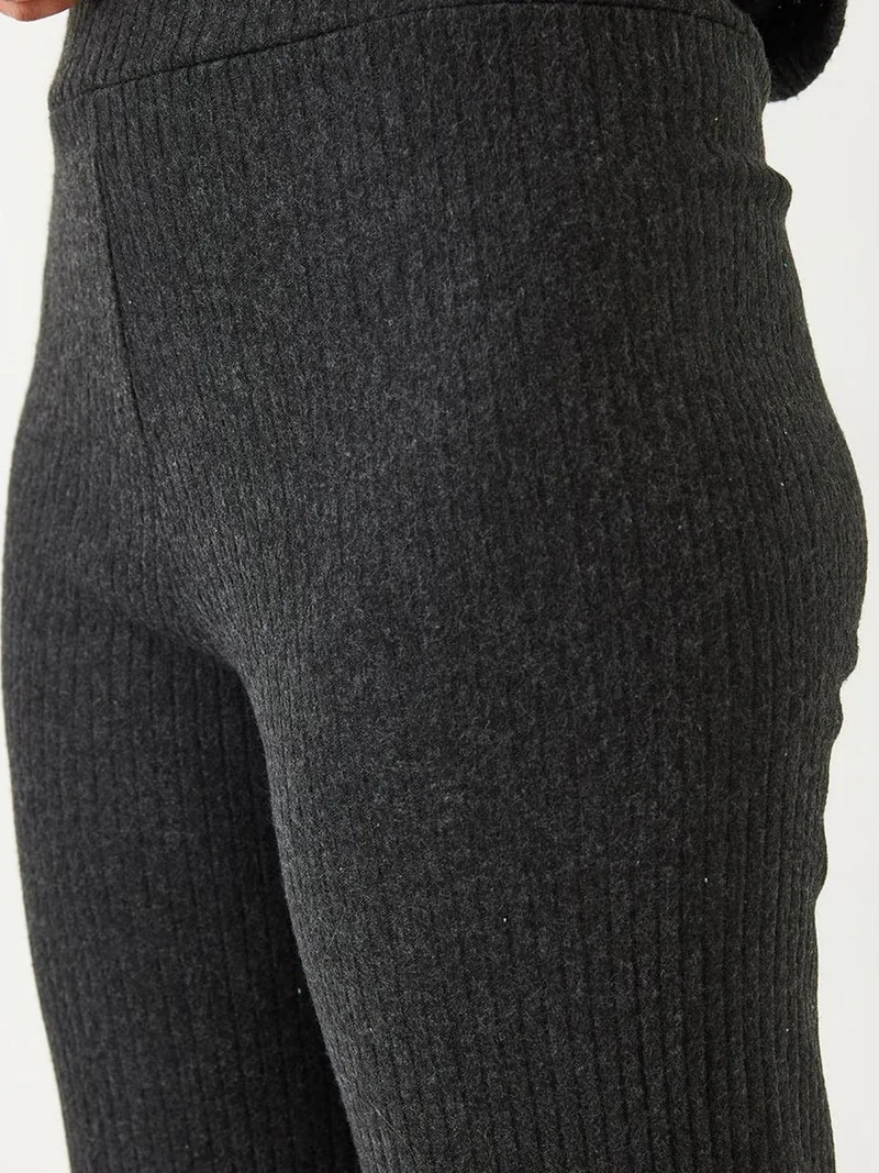 بيانكو لوتشي طقم سترة وبنطلون بياقة دائرية بنسيج مضلع من لوكسي