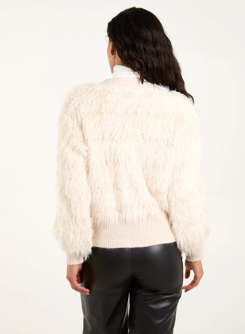 بلو فانيلا كارديجان بأزرار لؤلؤ منفوش