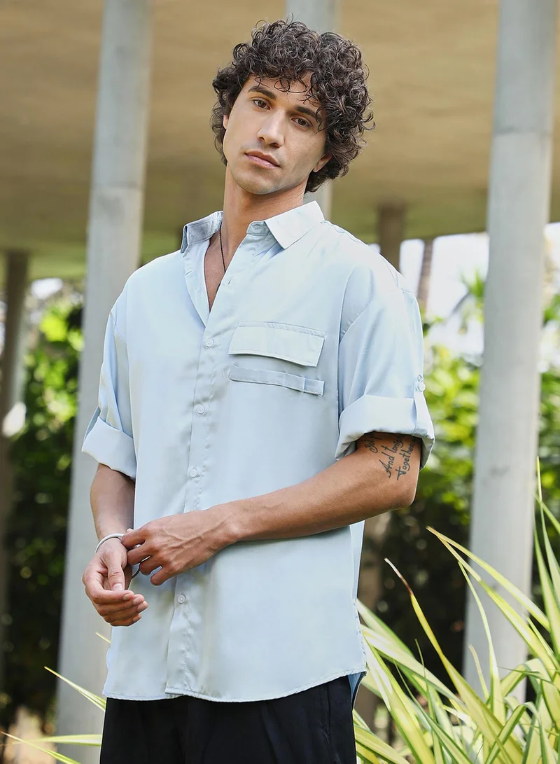 Campus Sutra Campus Sutra Men's Powder Blue Satin-Utility Oversized Shirt For Casual Wear | Spread Collar | Short Regular Sleeves | Button Closure | Oversized Shirt Crafted With Comfort Fit For Everyday Wear