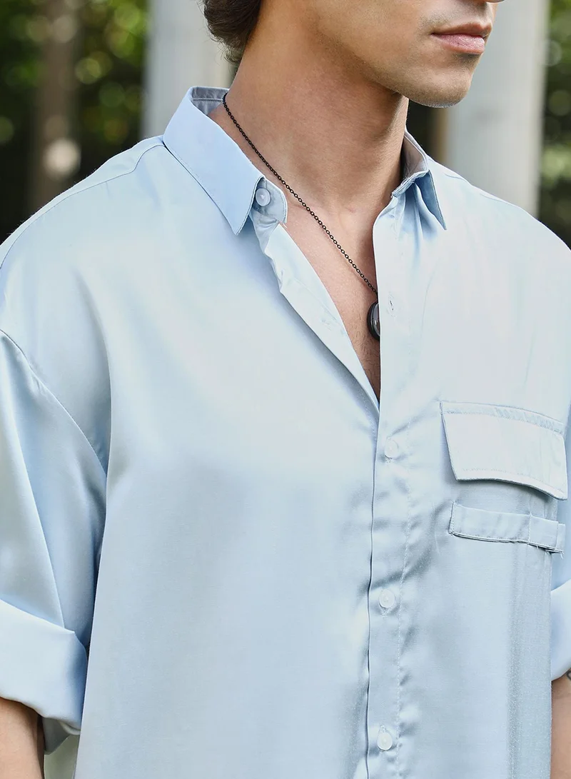Campus Sutra Campus Sutra Men's Powder Blue Satin-Utility Oversized Shirt For Casual Wear | Spread Collar | Short Regular Sleeves | Button Closure | Oversized Shirt Crafted With Comfort Fit For Everyday Wear