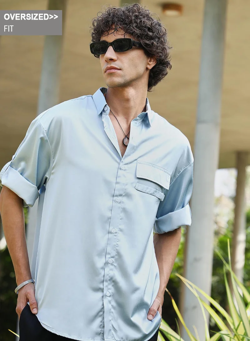Campus Sutra Campus Sutra Men's Powder Blue Satin-Utility Oversized Shirt For Casual Wear | Spread Collar | Short Regular Sleeves | Button Closure | Oversized Shirt Crafted With Comfort Fit For Everyday Wear