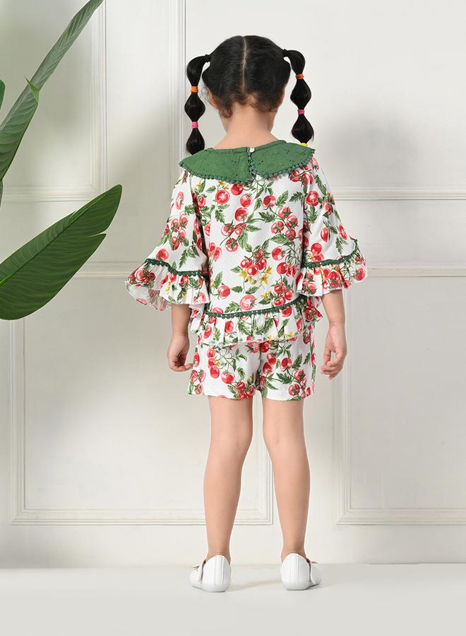 بيلا مودا طقم بيلا مودا بلوزة وشورت بطبعات وحافة مكشكشة ورقبة مستديرة - Image 2