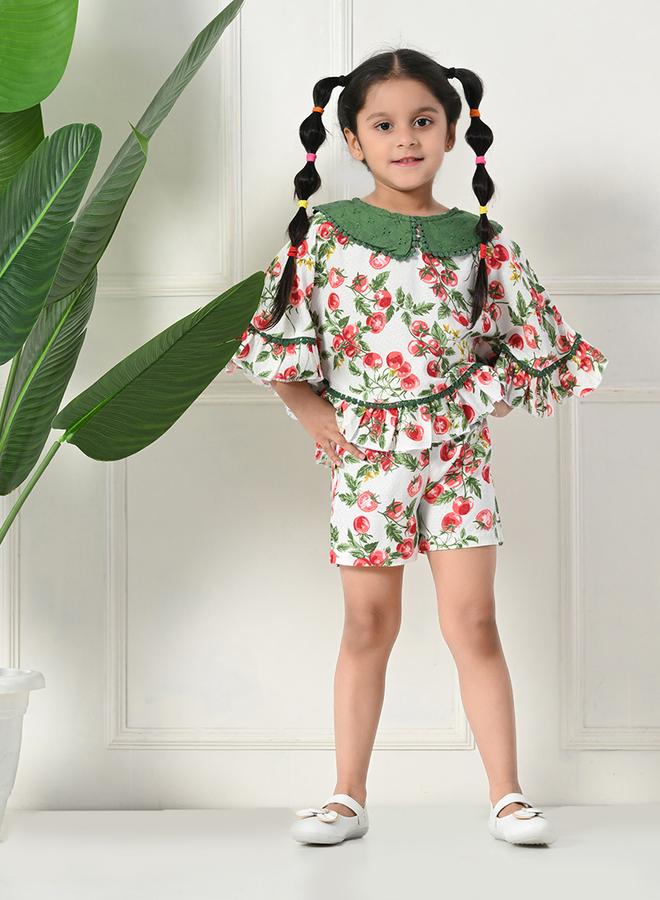 بيلا مودا طقم بيلا مودا بلوزة وشورت بطبعات وحافة مكشكشة ورقبة مستديرة - Image 1