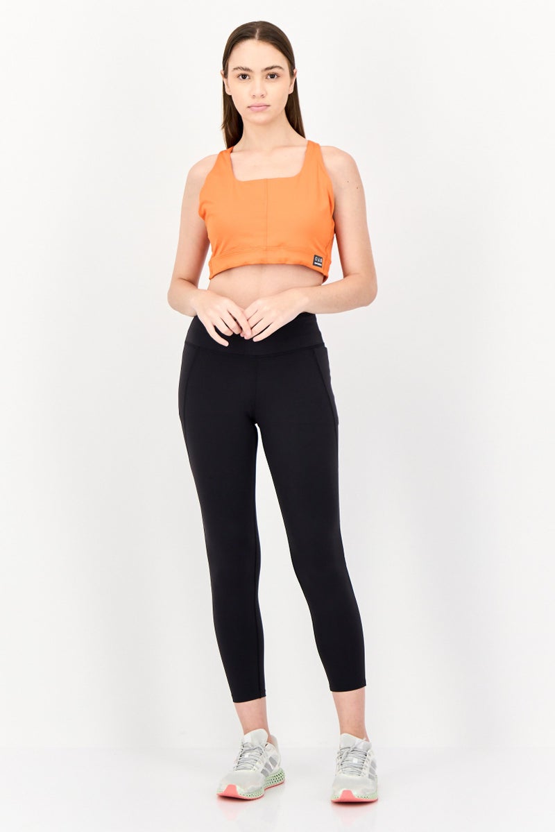 New Balance Women Brand Logo Lightly Padded Sports Bra, Orange - Image 4