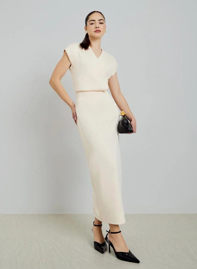 Off-White Solid Straight Fit Midi Skirt