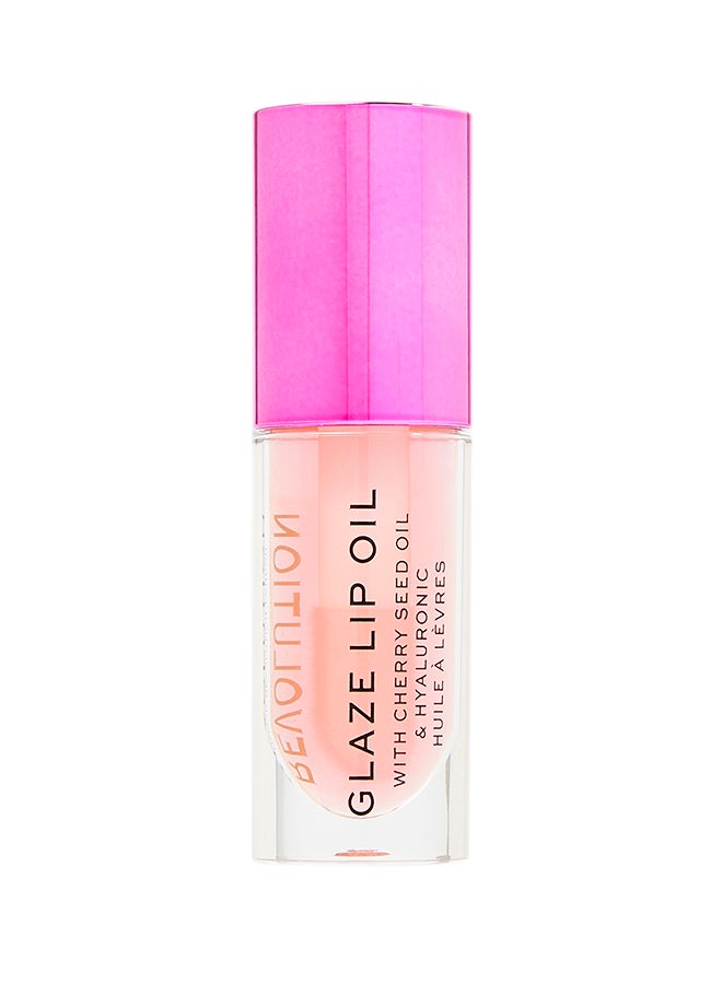 REVOLUTION زيت الشفاه اللامع باللون الوردي اللامع