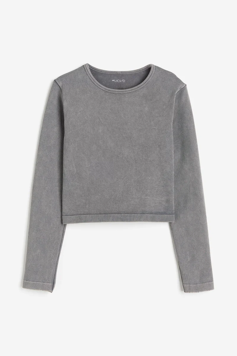 اتش اند ام بلوزة رياضية بتصميم مرن من نسيج دراي موف